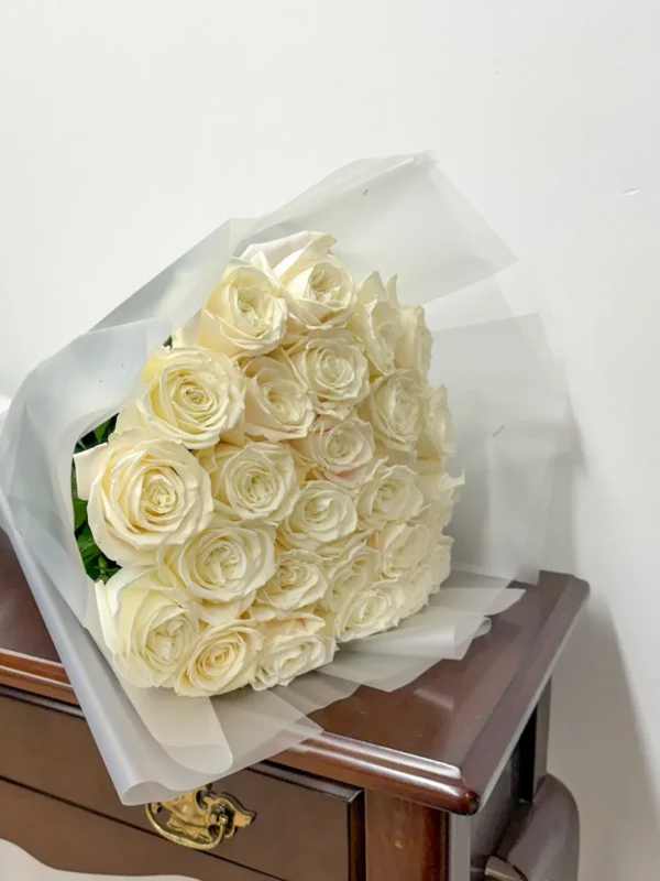 Ecuadorian white rose bouquet in translucent white wrap