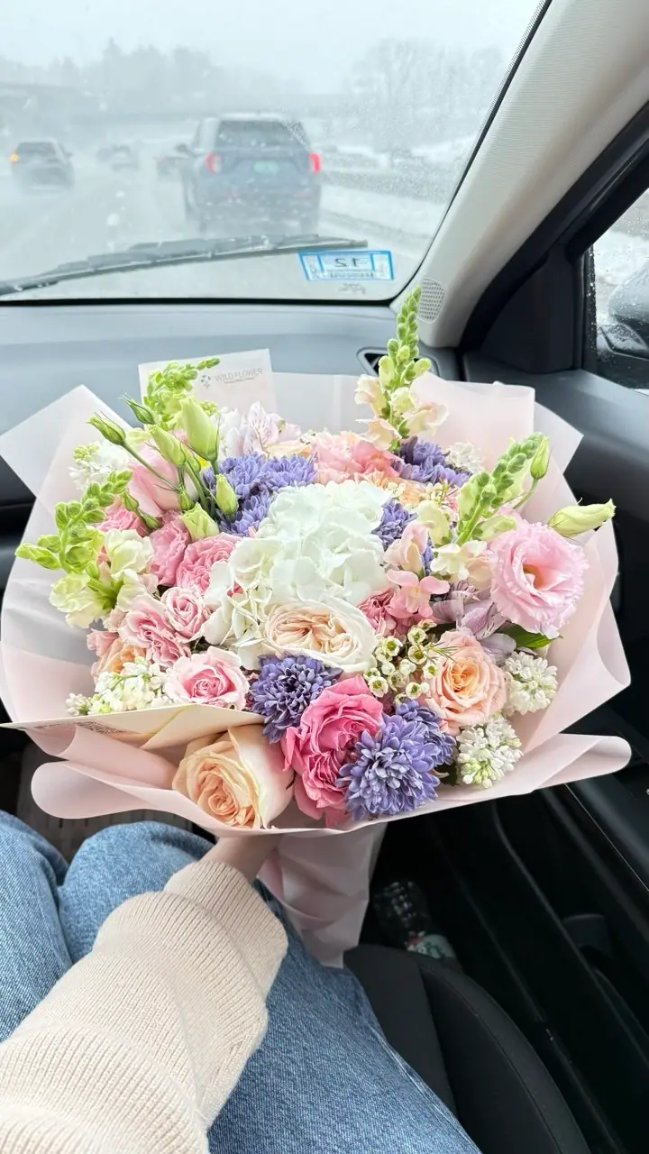 Lilac and pink hand-tied bouquet by Wildflower Boston